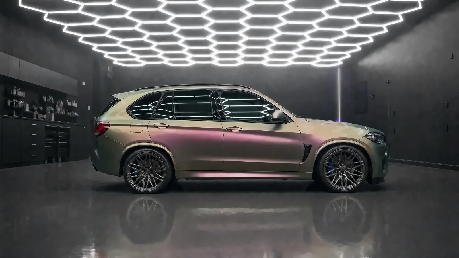 BMW X5 M, Color-shift wrap + chrome delete (studio illustration)