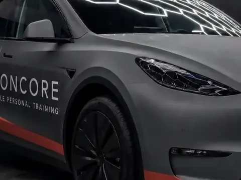 Tesla Model Y, Commercial livery · IRONCORE (fictional brand) (studio illustration), photo 3