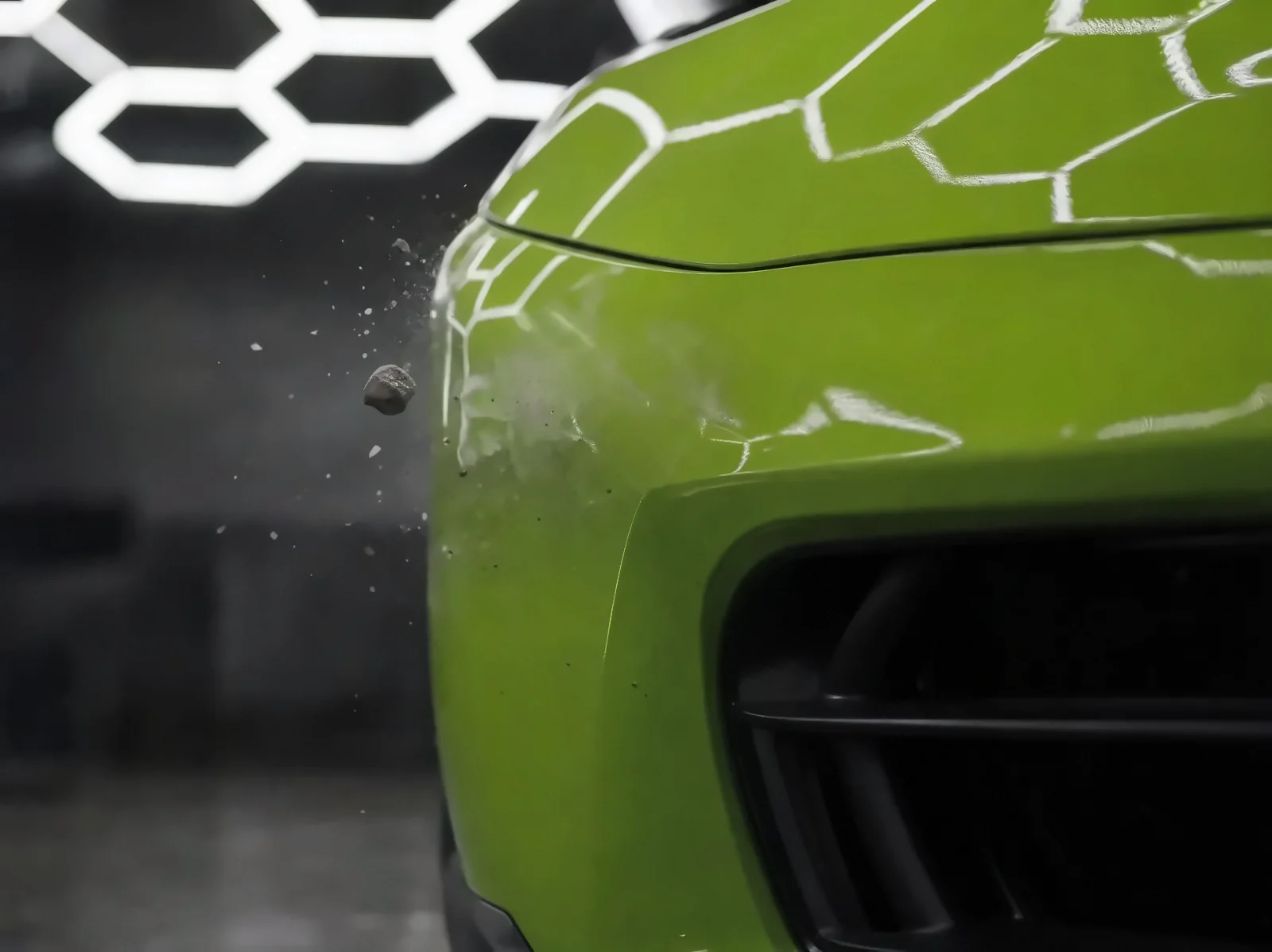 A stone bouncing off a film-protected bumper (illustration)